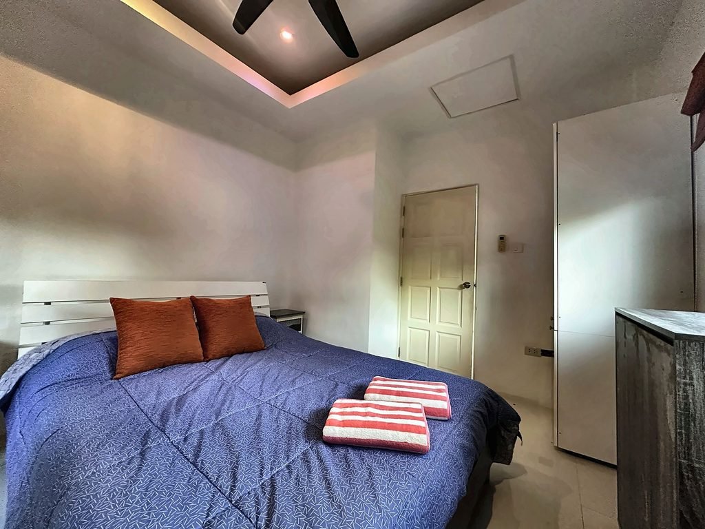 BangsarayPool villa guest room with Double bed